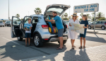 Family loading rental car in Javea lot